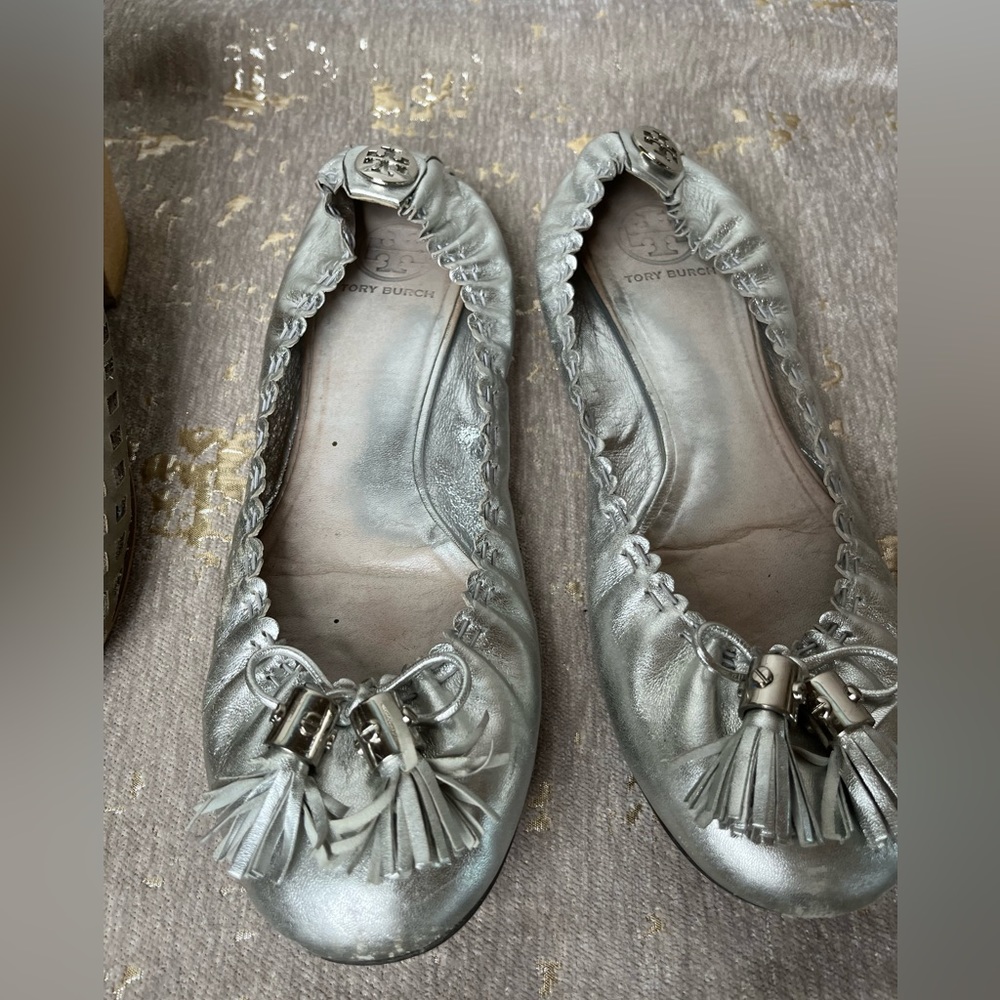 Silver Tory Burch ballet flats with tassel